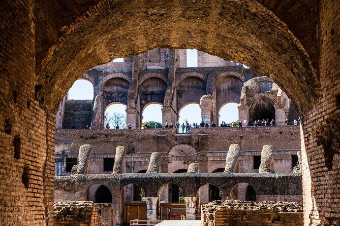 Colosseum Guided Tour and Ancient Rome - Inside the Colosseum: Arena Views, Underground Look, And That Second-Floor Art