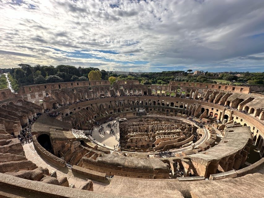 Colosseum with Arena Floor & Ancient Rome, Semi-Private Tour - Walking the Curia-area streets in the Roman Forum