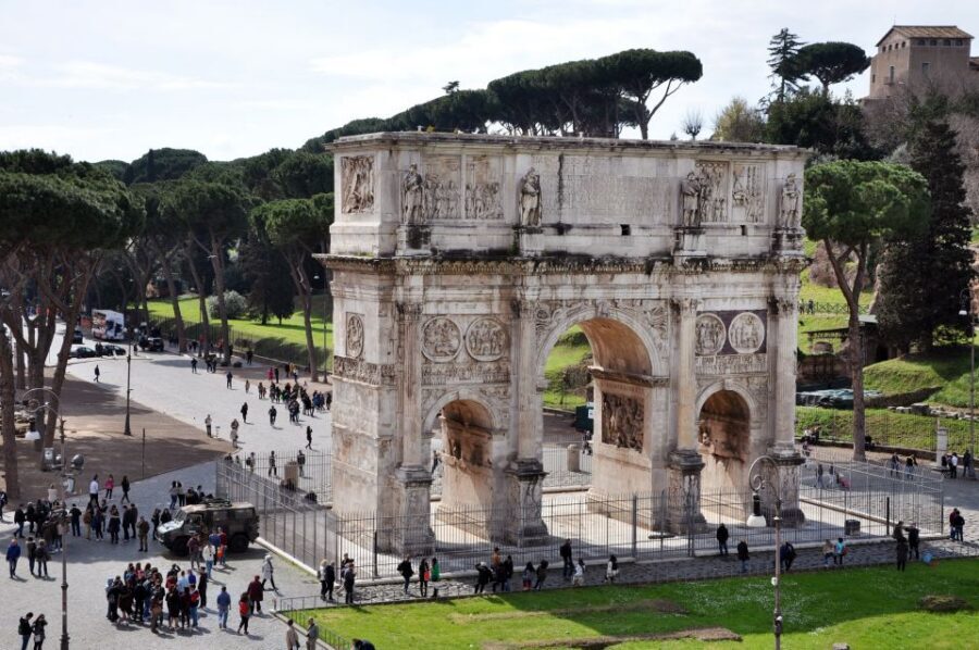 Rome: Colosseum and Ancient Rome Guided Walking Tour - Entering the Colosseum: the scale hits fast