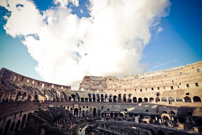 Small-group Colosseum, Forum and Palatine Guided Tour - Arch of Constantine: a quick stop with extra payoff
